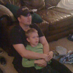 Kristopher Lauchner watching TV with Sage Capuano