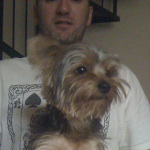 Kristopher Lauchner with our mangy dog