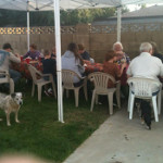 Desiree's extended family having a backyard dinner