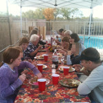 Desiree's extended family having a backyard dinner