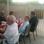 Desiree's extended family having a backyard dinner